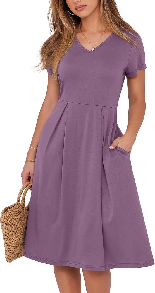 Amazon listing photo of the ANRABESS mauve V-neck midi dress, model with both hands in the pockets